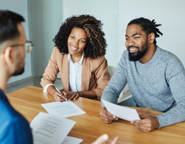 three colleagues in a meeting