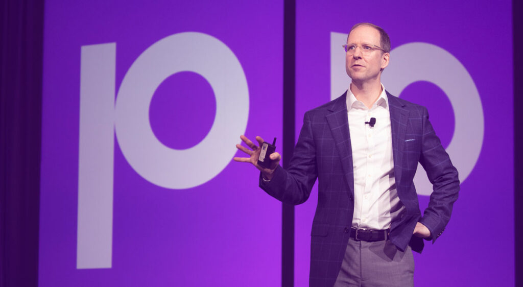 Josh Rogers at a speaking event.