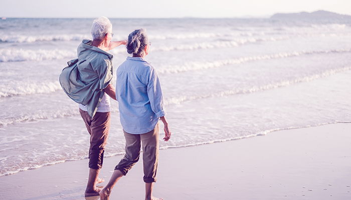 Couple walking on beach