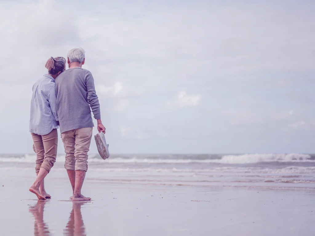 Couple walking on beach